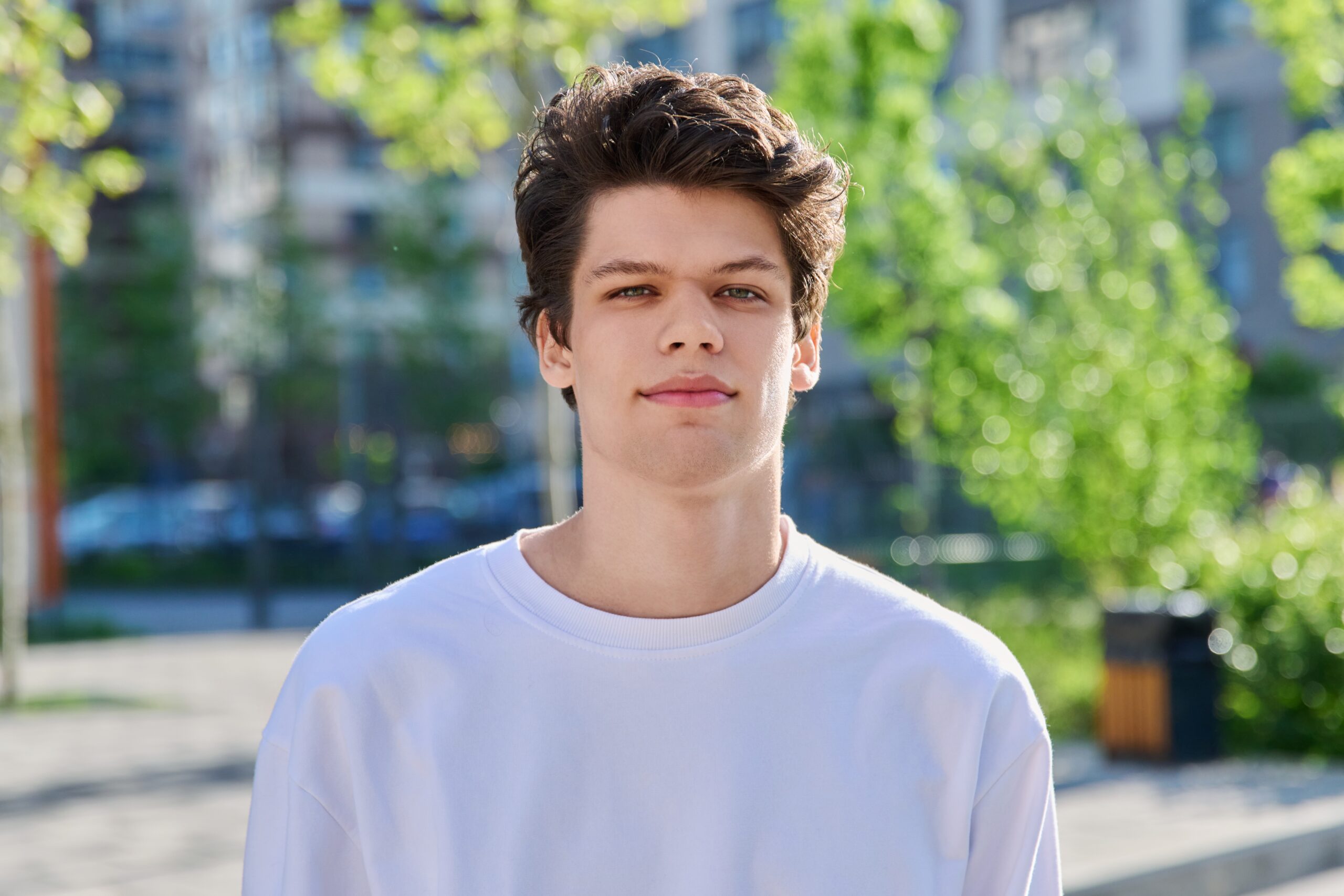 Headshot,Portrait,Of,Handsome,Guy,19,,20,Years,Old,,Looking