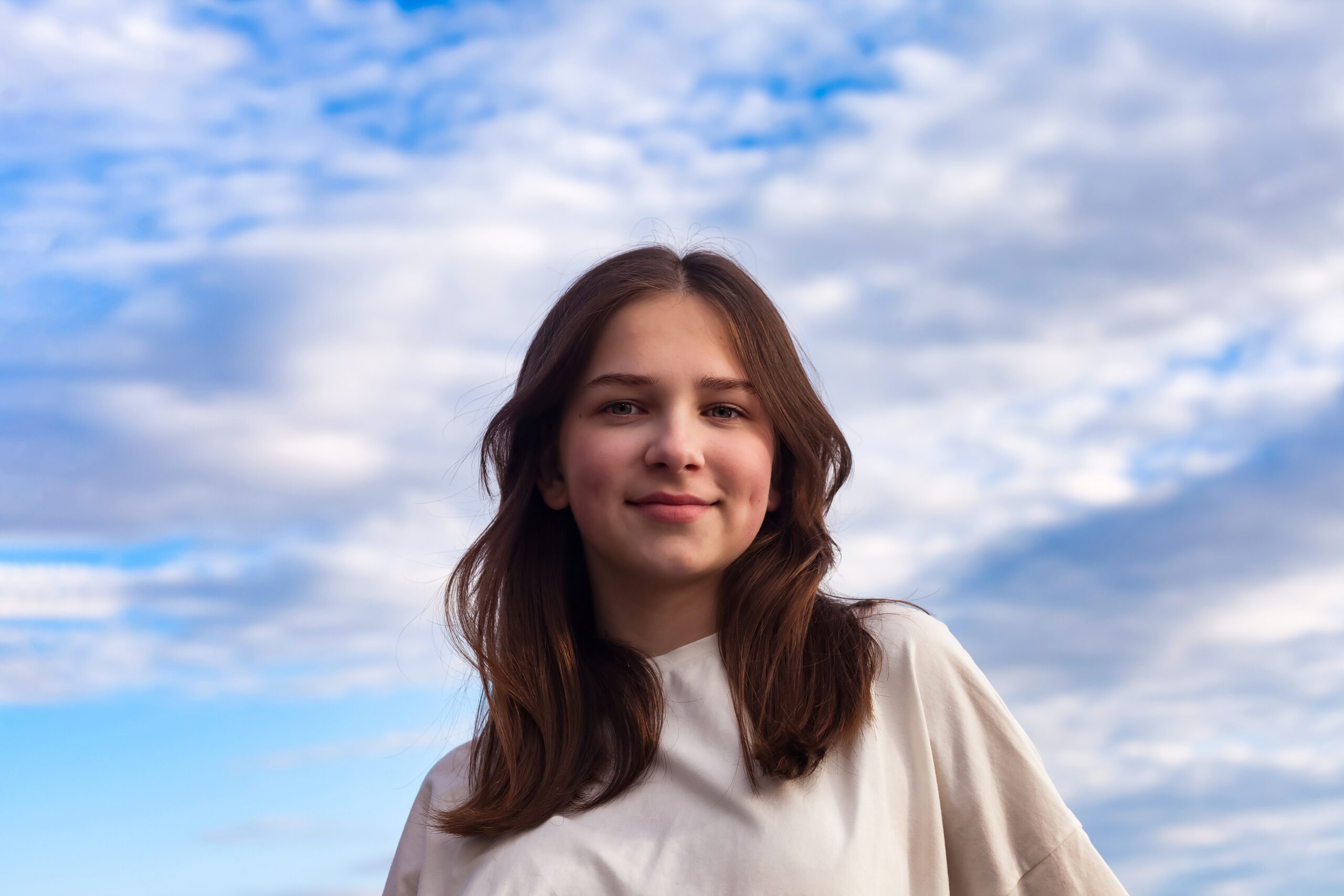 Portrait,Of,Cute,Teen,Girl,With,Dimples,In,White,Jacket