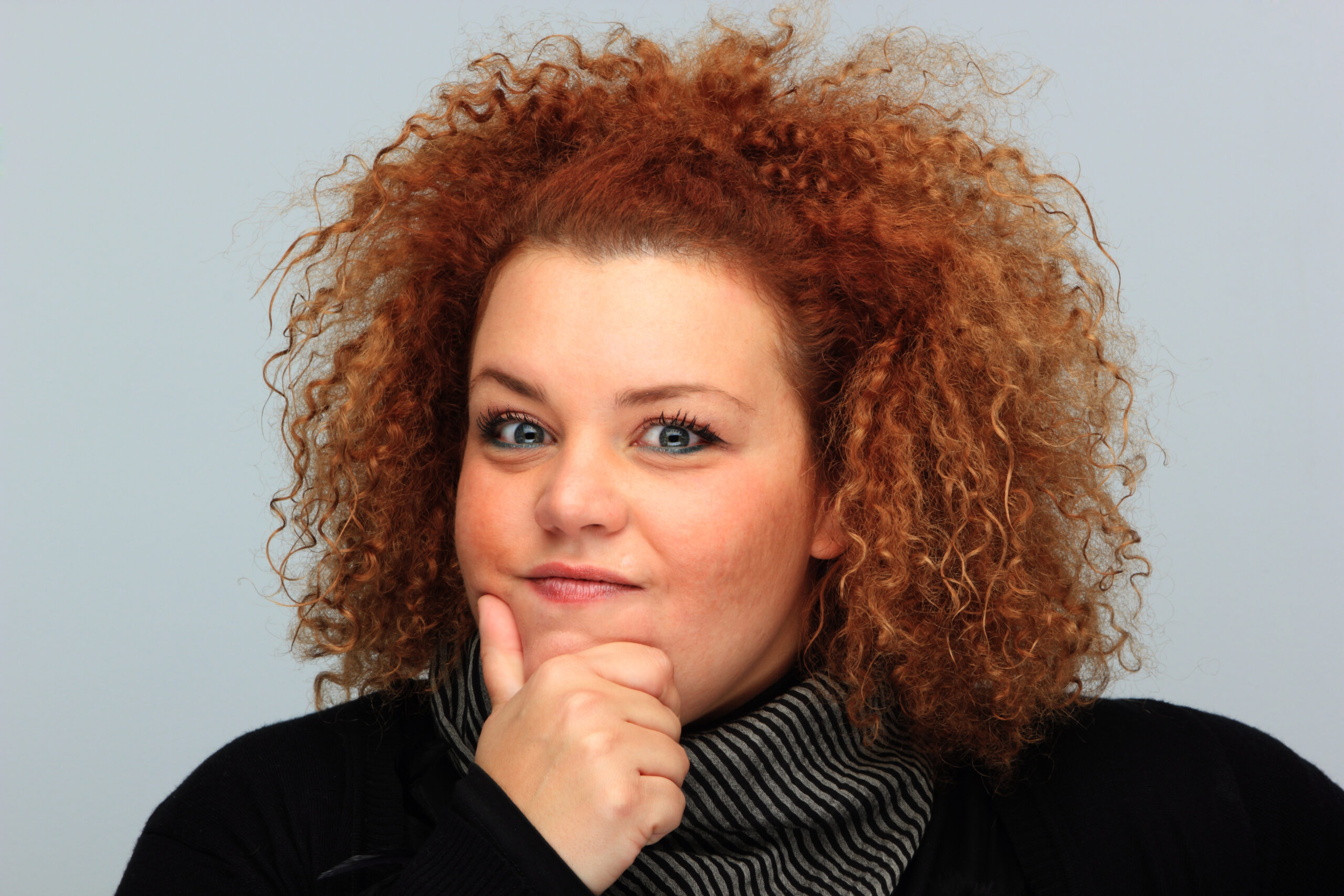 Contrast,Portrait,Of,Beautiful,Blond,Plus-size,Girl,Making,Faces